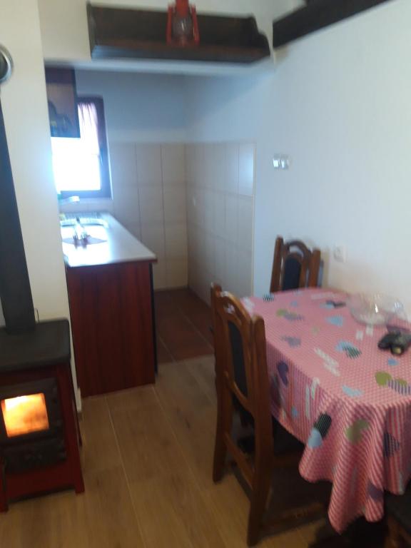 Kuchyň nebo kuchyňský kout v ubytování Kolibica