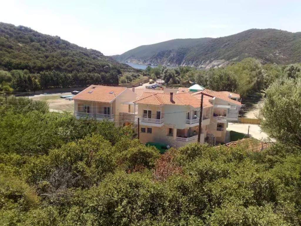 an aerial view of a house in the middle of trees at VILLEA VILLAGE in Kalamitsi