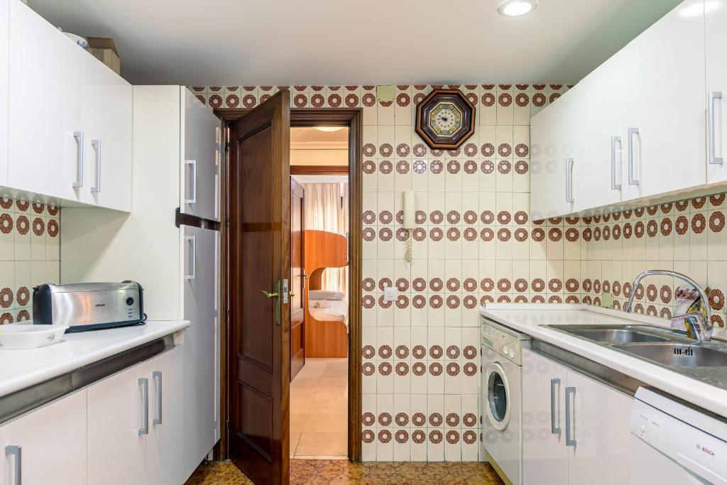 Kuchyň nebo kuchyňský kout v ubytování Green- Apartments Las Setas