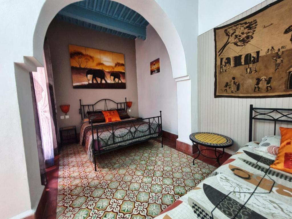 Postel nebo postele na pokoji v ubytování Riad Sidi Magdoul
