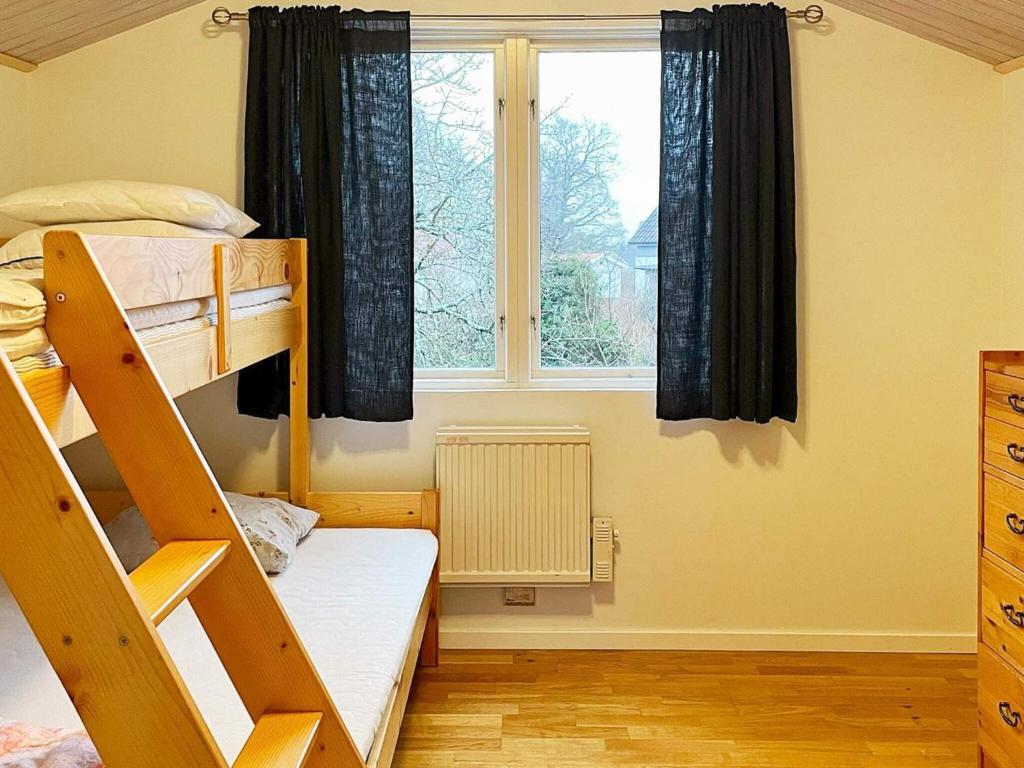 Postel nebo postele na pokoji v ubytování Holiday home SÖLVESBORG XVI