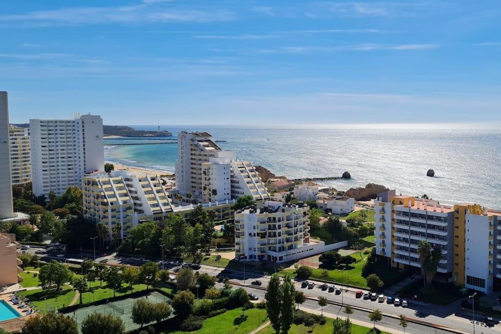 an aerial view of a city and the ocean at Vista Bonita with views on the ocean and the hills in Portimão