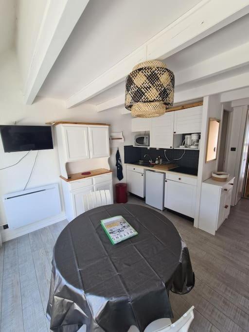 Kuchyňa alebo kuchynka v ubytovaní Appartement au bord de mer