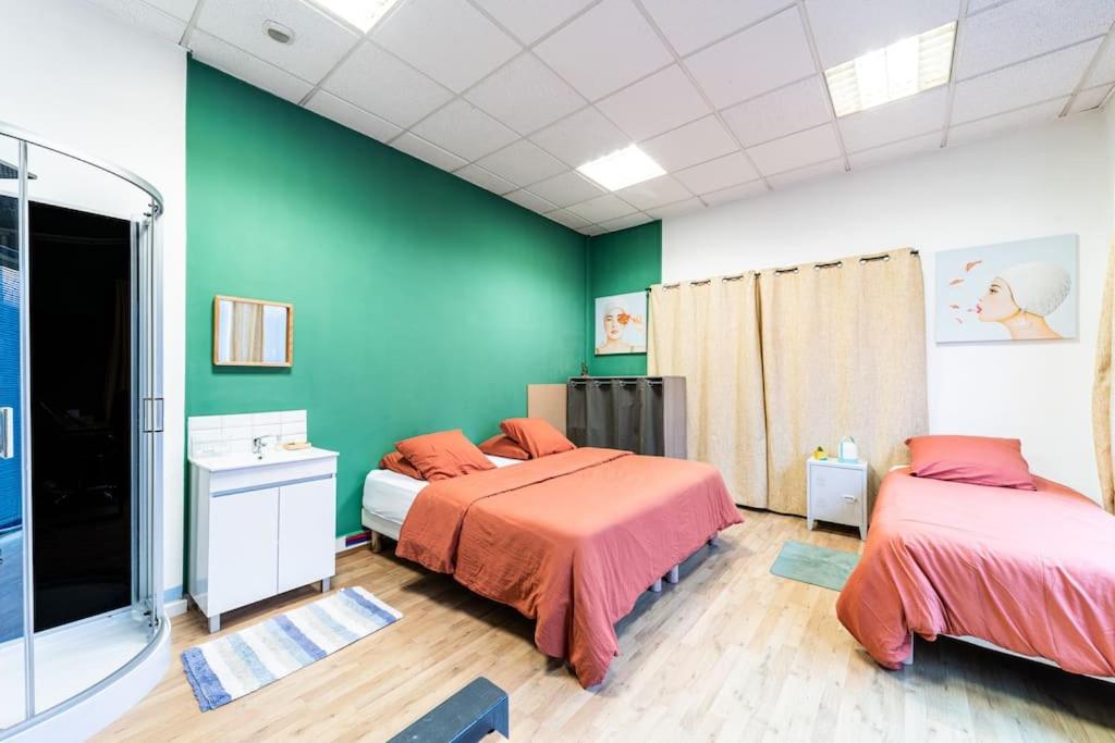 Posteľ alebo postele v izbe v ubytovaní Loft Dunkerque Centre