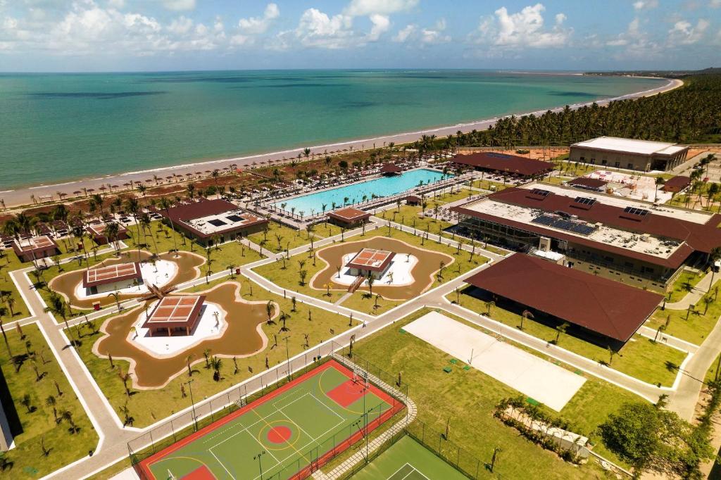 an aerial view of a resort next to the ocean at Vila Galé Resort Alagoas - All Inclusive in Barra de Santo Antônio