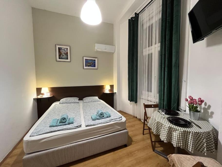 Posteľ alebo postele v izbe v ubytovaní 2# Sunflower Cozy Apartment