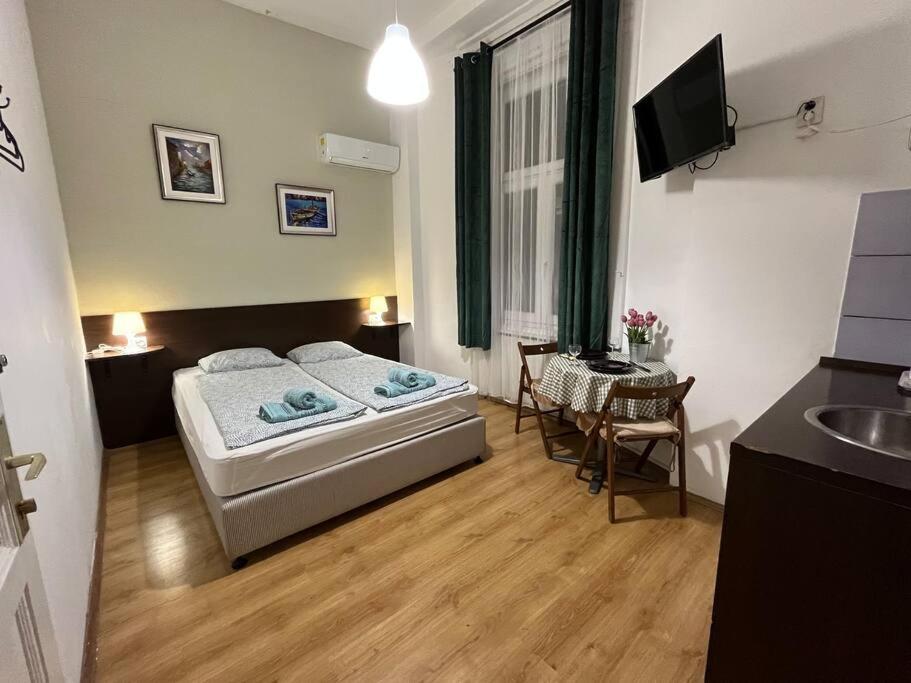 Posteľ alebo postele v izbe v ubytovaní 2# Sunflower Cozy Apartment
