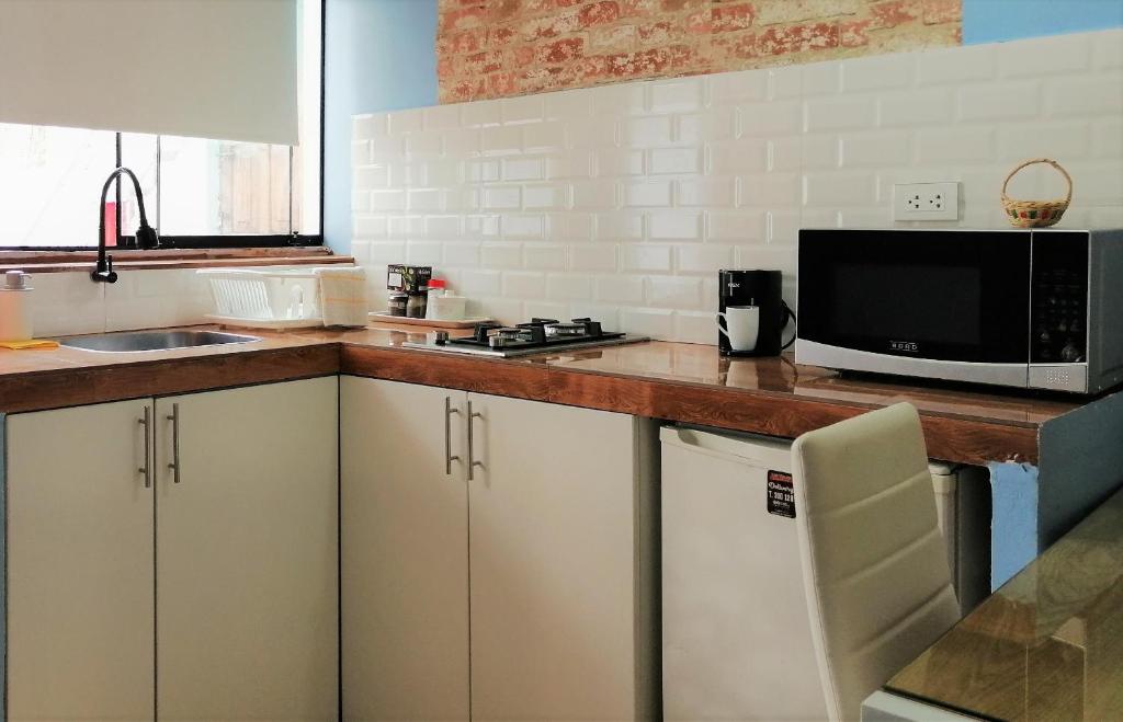 Kuchyň nebo kuchyňský kout v ubytování Casa Samaykuy