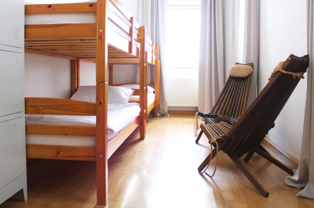 Postel nebo postele na pokoji v ubytování Hostel Kronotop in Triglav National Park