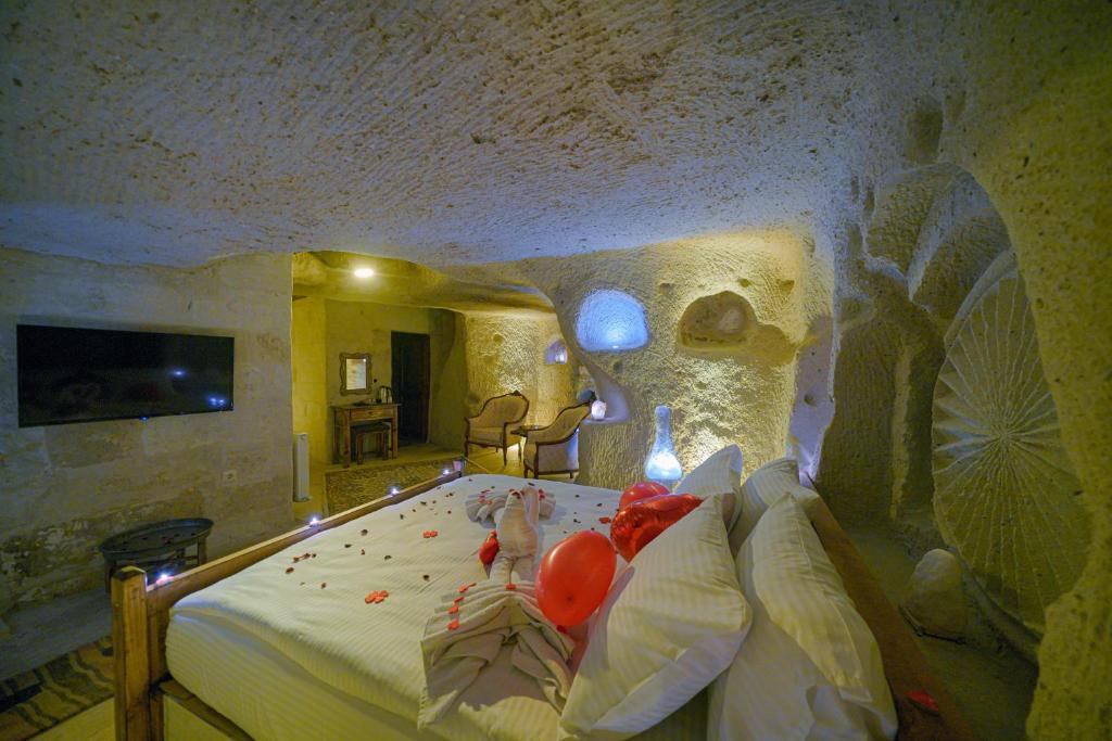 TV a/nebo společenská místnost v ubytování Babili Cappadocia Cave
