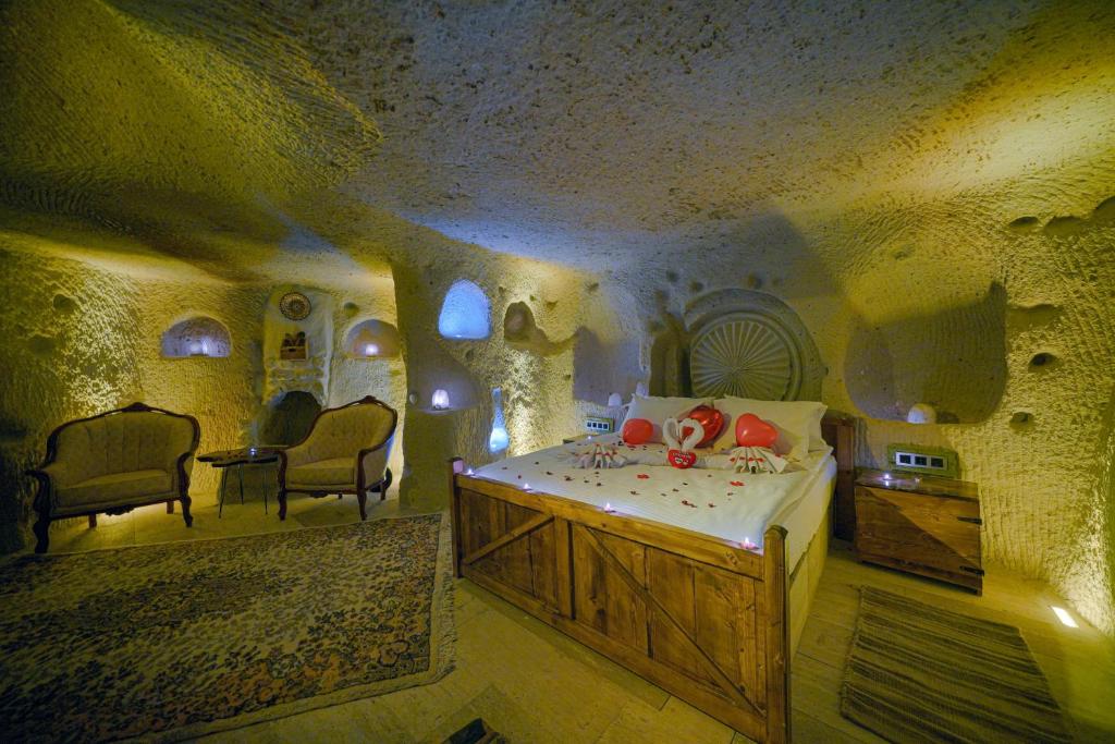Postel nebo postele na pokoji v ubytování Babili Cappadocia Cave