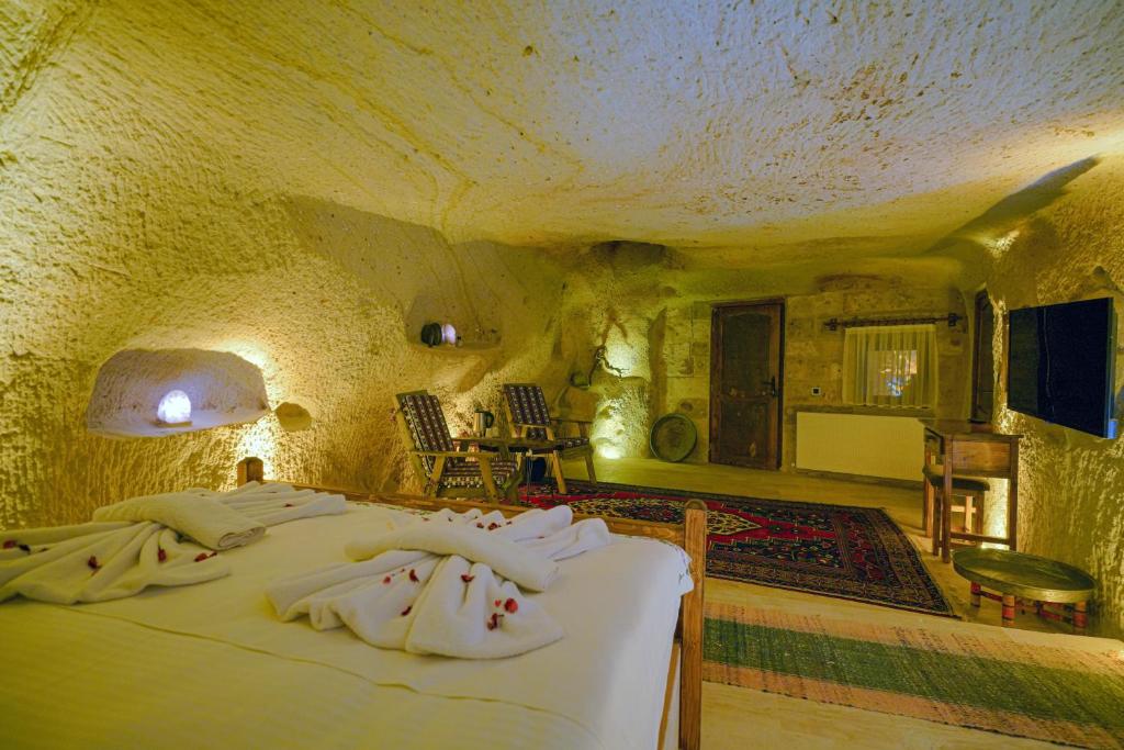 TV a/nebo společenská místnost v ubytování Babili Cappadocia Cave