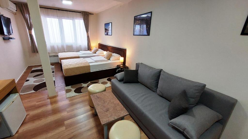 Postel nebo postele na pokoji v ubytování Hotel Villa Panorama