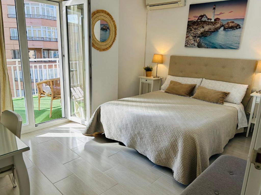 Posteľ alebo postele v izbe v ubytovaní Malagueta Beach Premium