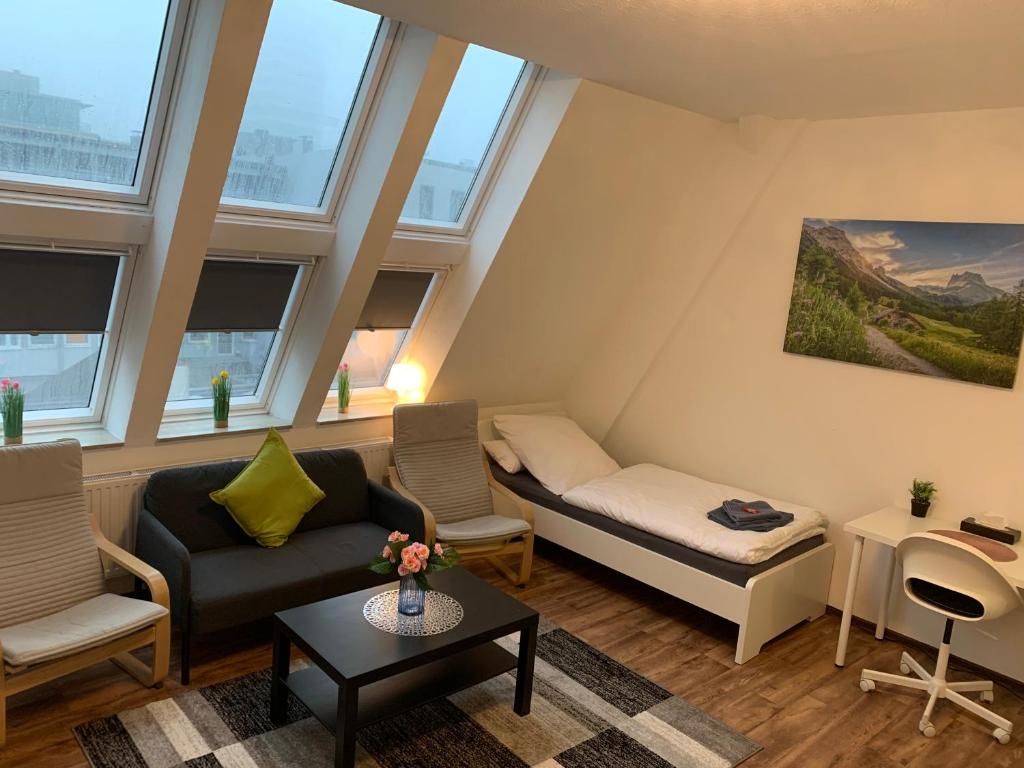 Posezení v ubytování CityApartment Platinum-Zentrum mit Parkplatz