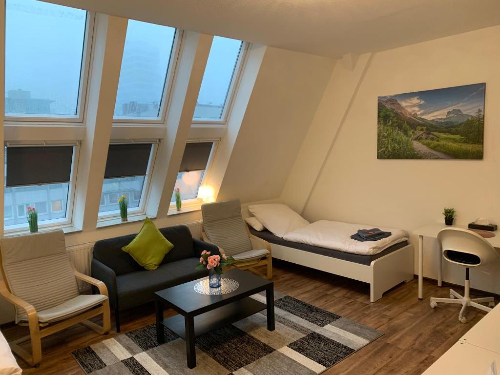 Posezení v ubytování CityApartment Platinum-Zentrum mit Parkplatz