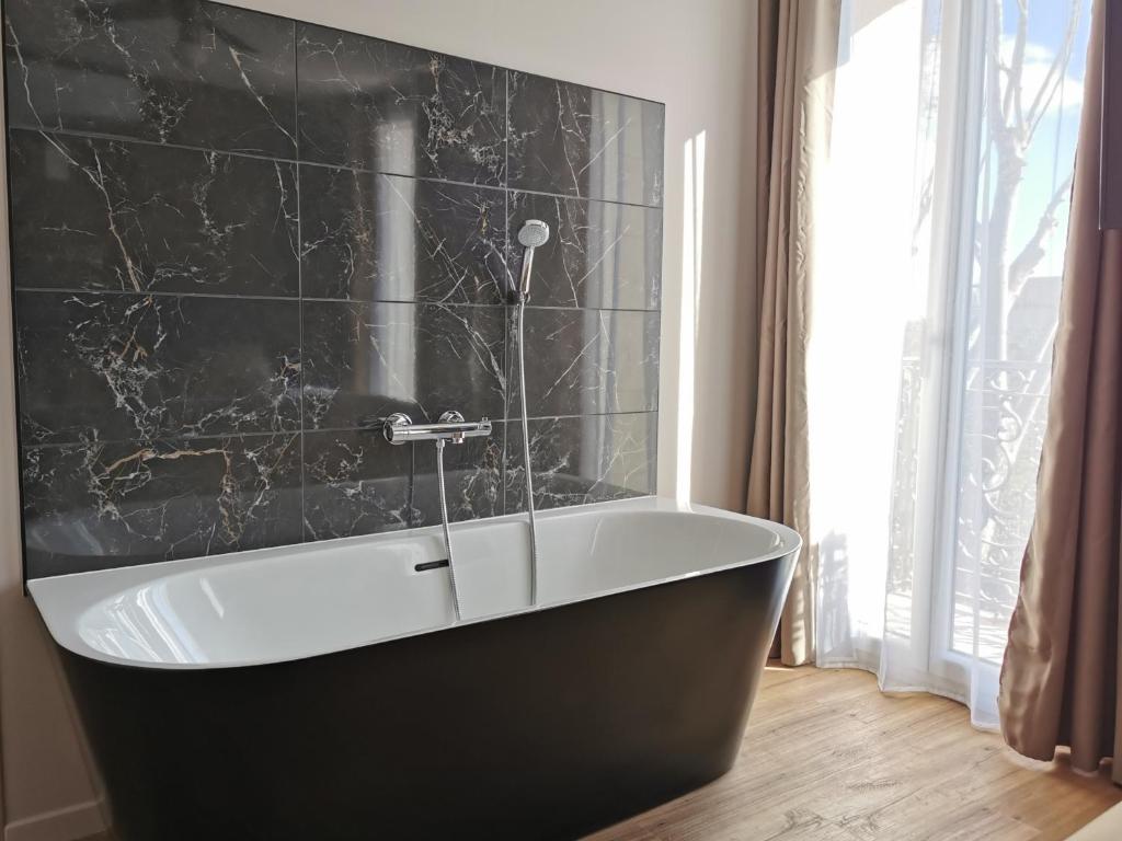 Kúpeľňa v ubytovaní Appart Hotel Spa Perpignan