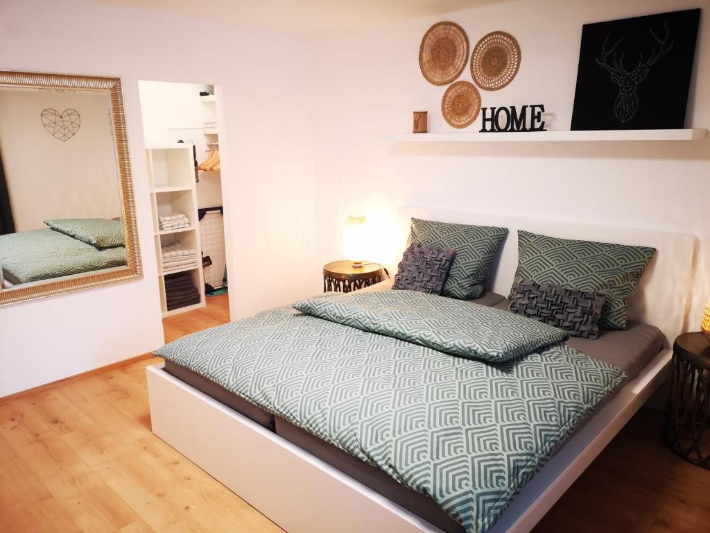 Postel nebo postele na pokoji v ubytování Ferienwohnung Lieblingszeit