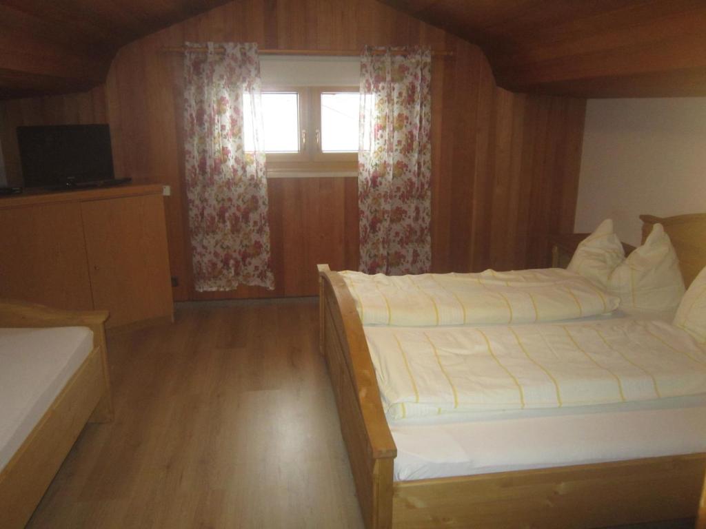 Postel nebo postele na pokoji v ubytování Hotel Garni Austermayer