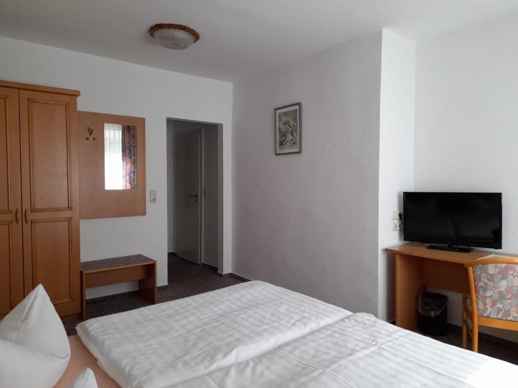 Postel nebo postele na pokoji v ubytování Pension Landhaus Machold