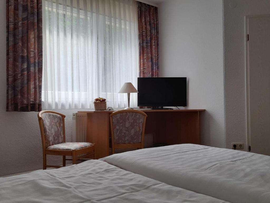 TV a/nebo společenská místnost v ubytování Pension Landhaus Machold