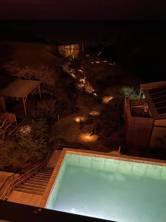 Bazén v ubytování Eolia Sustainable Design Hotel nebo v jeho okolí