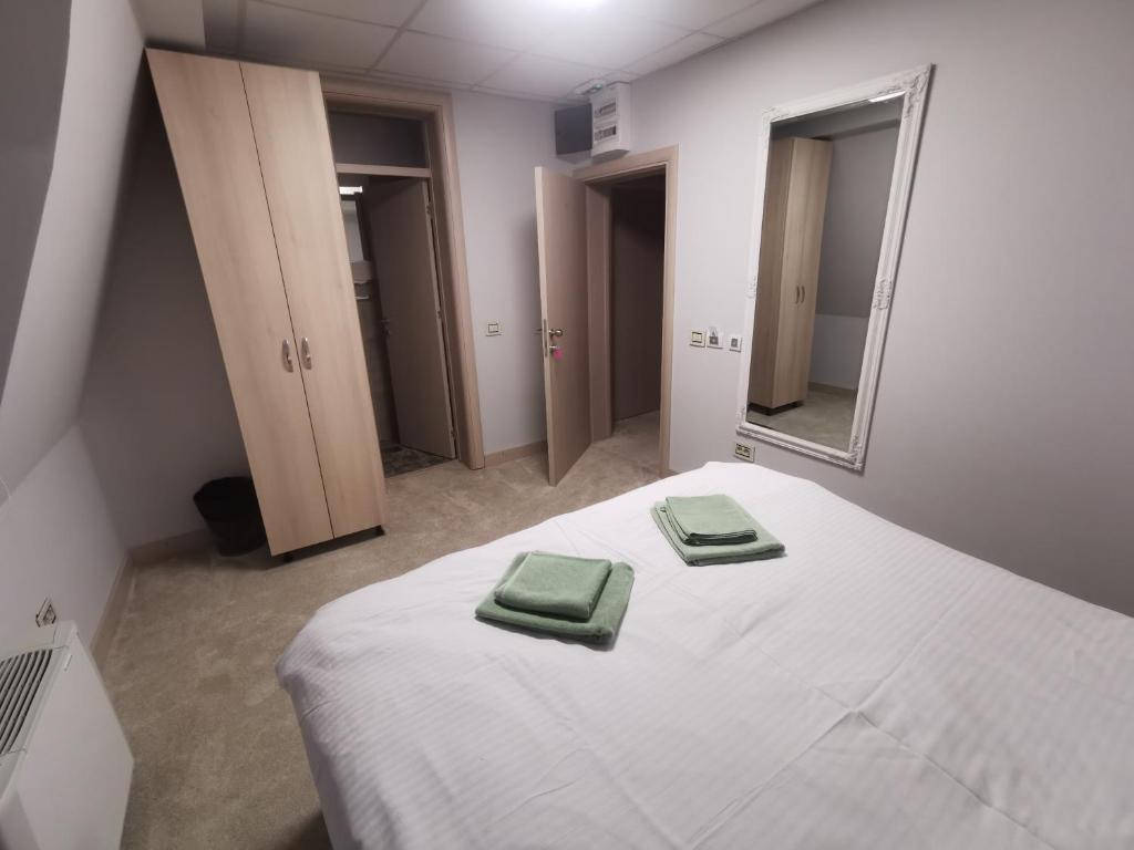 Postel nebo postele na pokoji v ubytování City SMART