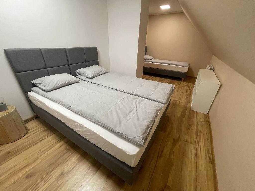 Posteľ alebo postele v izbe v ubytovaní Dom Pod Świerkami