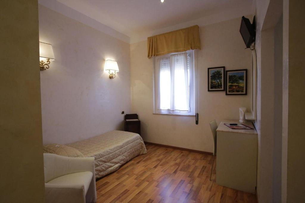 TV a/nebo společenská místnost v ubytování Hotel Vienna Ostenda e Ristorante il Danubio