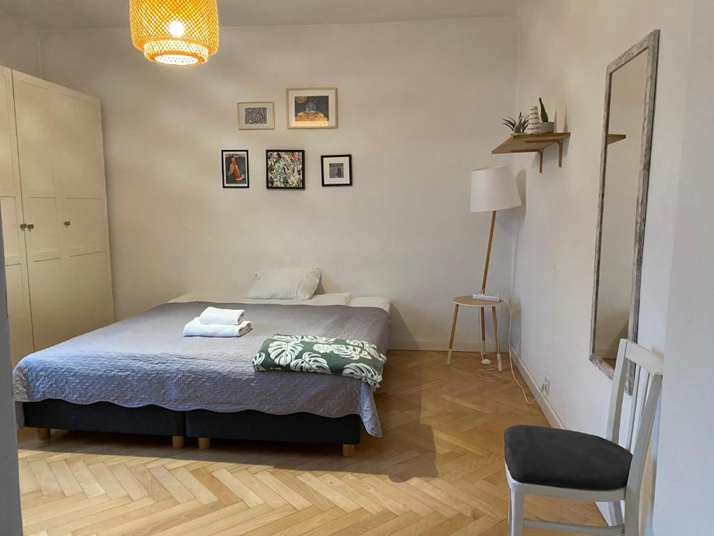 Posteľ alebo postele v izbe v ubytovaní Slow Life Apartment next to Metro Station