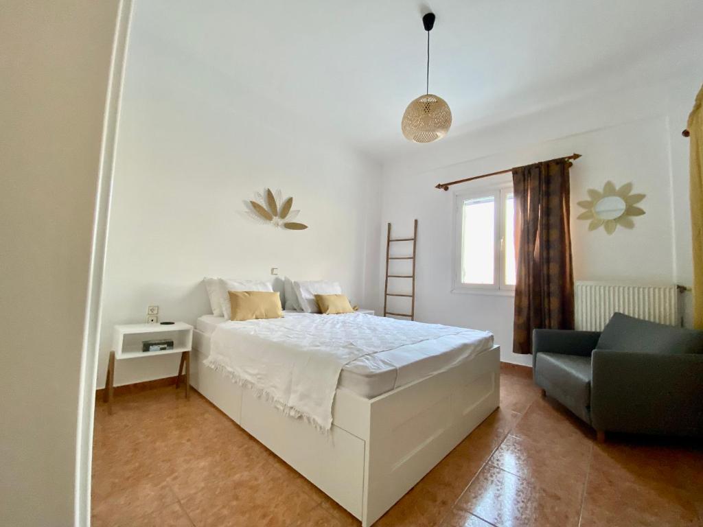 Postel nebo postele na pokoji v ubytování Olive House Apartment Paros