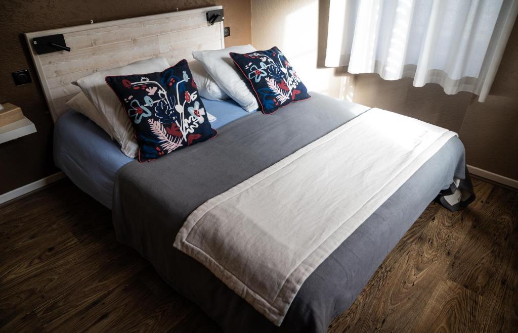Postel nebo postele na pokoji v ubytování Gite Auberge Les Cascades