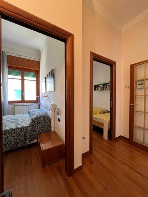 A bed or beds in a room at La Casa sul Corso
