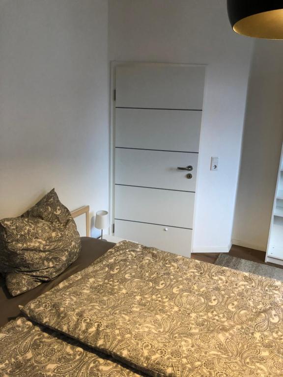 Postel nebo postele na pokoji v ubytování Ferienwohnung Zimmermann