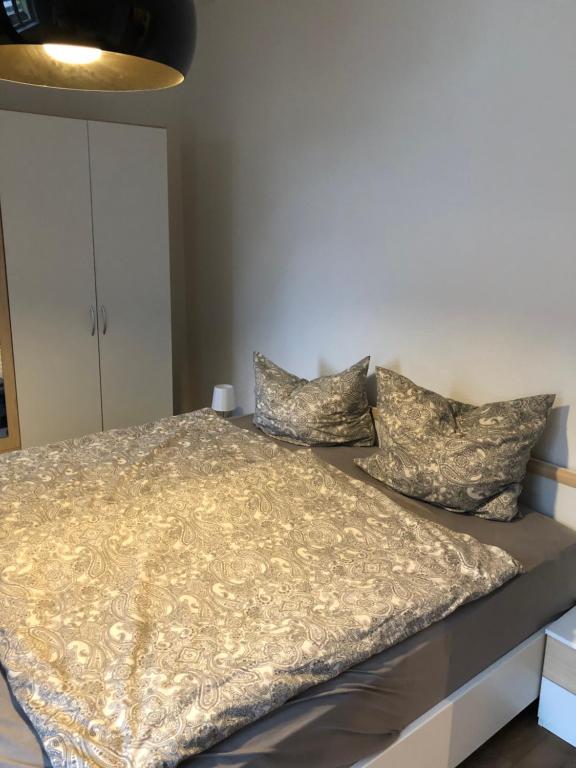 Postel nebo postele na pokoji v ubytování Ferienwohnung Zimmermann