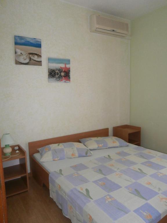 Postel nebo postele na pokoji v ubytování Apartments & Rooms Tony