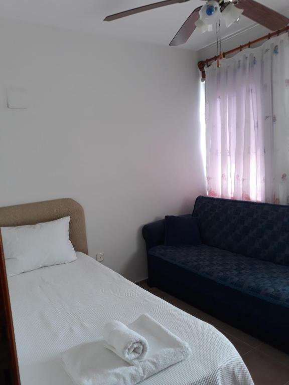 Postel nebo postele na pokoji v ubytování Villa Asel