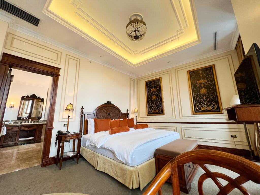 Postel nebo postele na pokoji v ubytování Plaza Grande Hotel