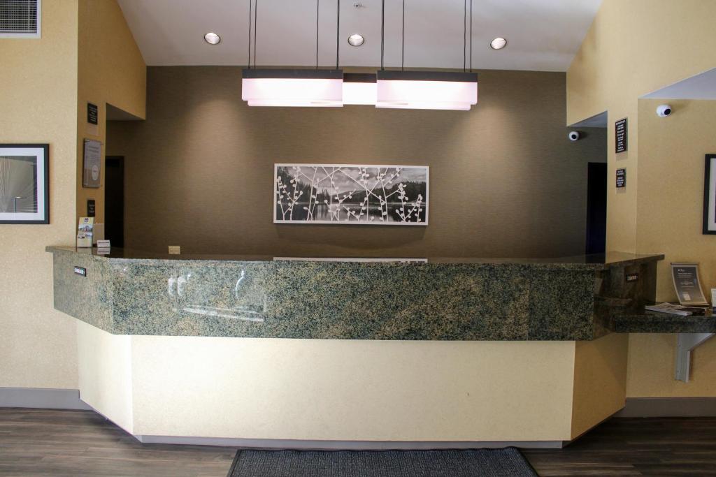 a lobby of a hospital with a reception counter at Sleep Inn in Bend