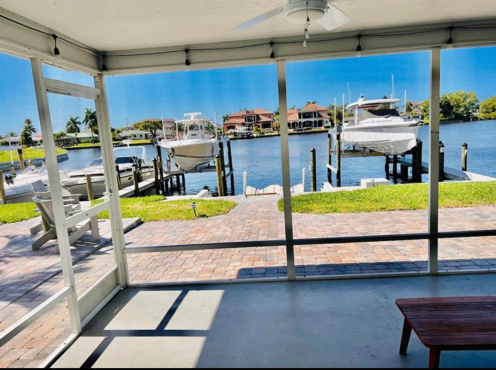 a view of a marina from the porch of a house at Cheerful home with two Bedrooms in Cape Coral