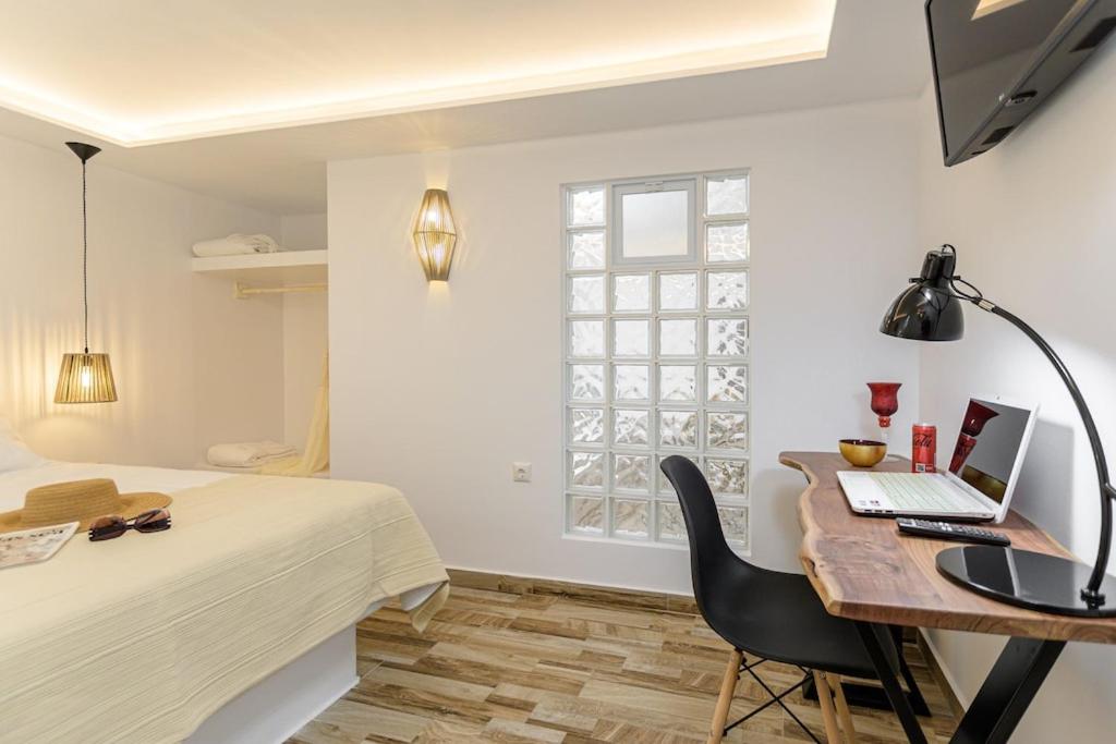 Posteľ alebo postele v izbe v ubytovaní Naxian Nest 2BR Apart Near Beach - Semi Basement