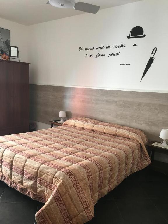 Postel nebo postele na pokoji v ubytování Bed & Breakfast Hostel H24
