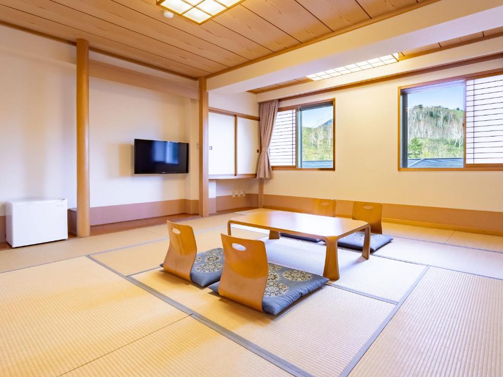 TV a/nebo společenská místnost v ubytování Sachinoyu Hotel Shiga Kogen