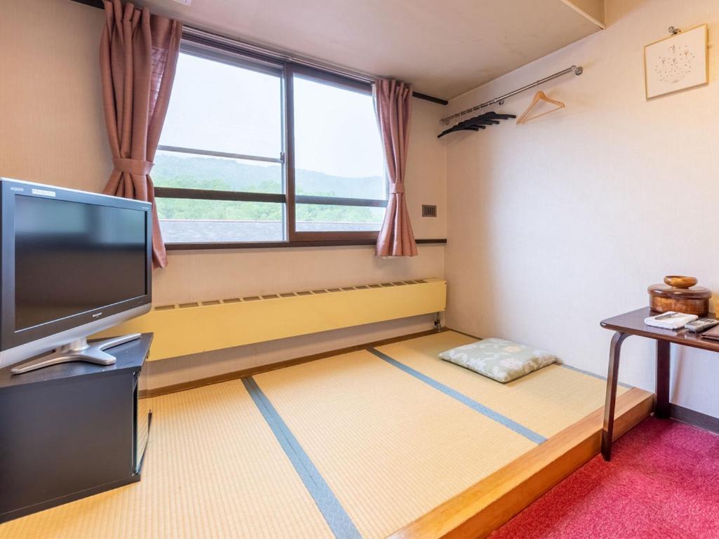 TV a/nebo společenská místnost v ubytování Sachinoyu Hotel Shiga Kogen