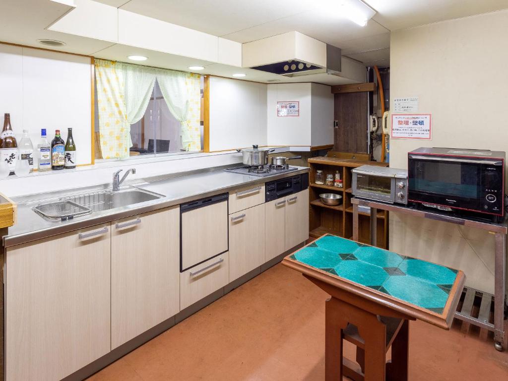 Kuchyň nebo kuchyňský kout v ubytování Sachinoyu Hotel Shiga Kogen
