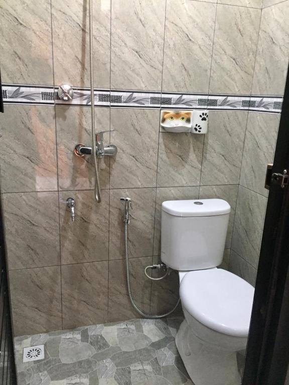 Koupelna v ubytování Raditya Homestay