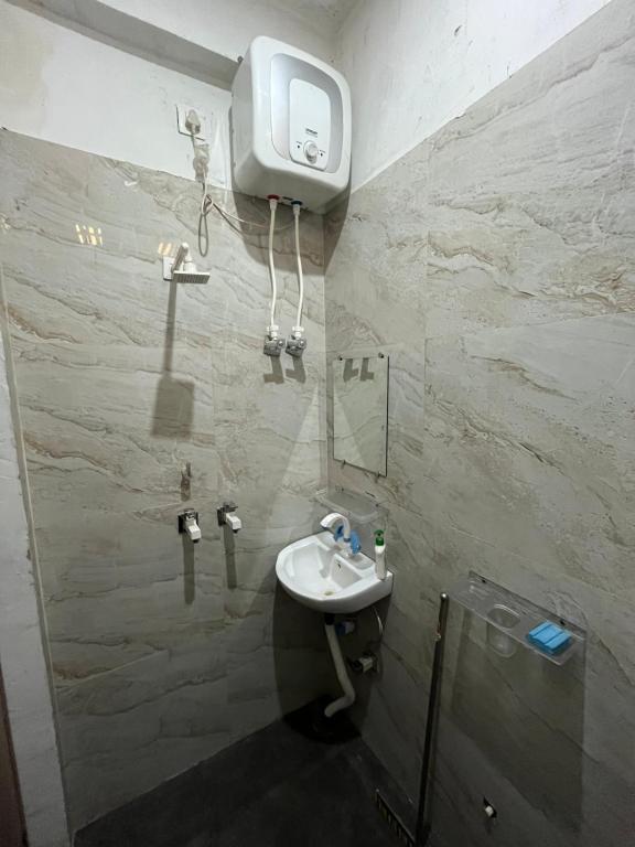 Koupelna v ubytování Prabhu Sadan home stay