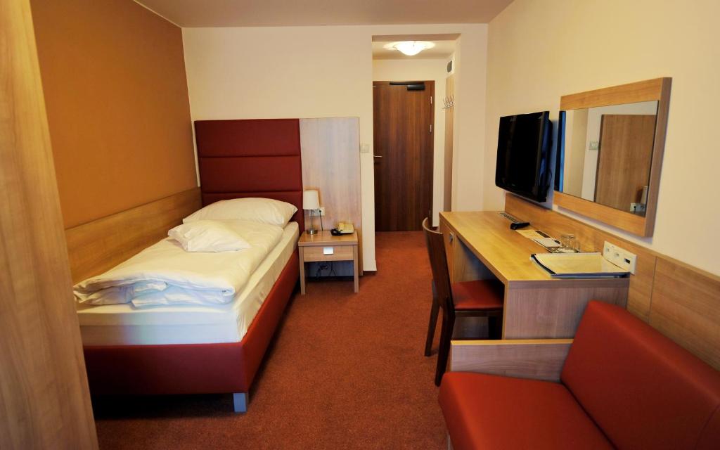 TV a/nebo společenská místnost v ubytování Hotel Club