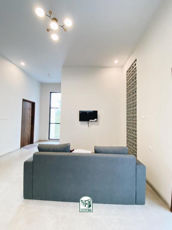 TV a/nebo společenská místnost v ubytování Kmanda House