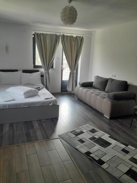 Voodi või voodid majutusasutuse Apartamente Ambrus E Studio 21 Praid toas